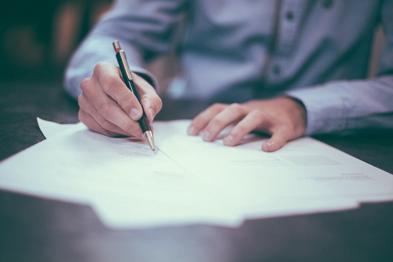 Man writing out his will