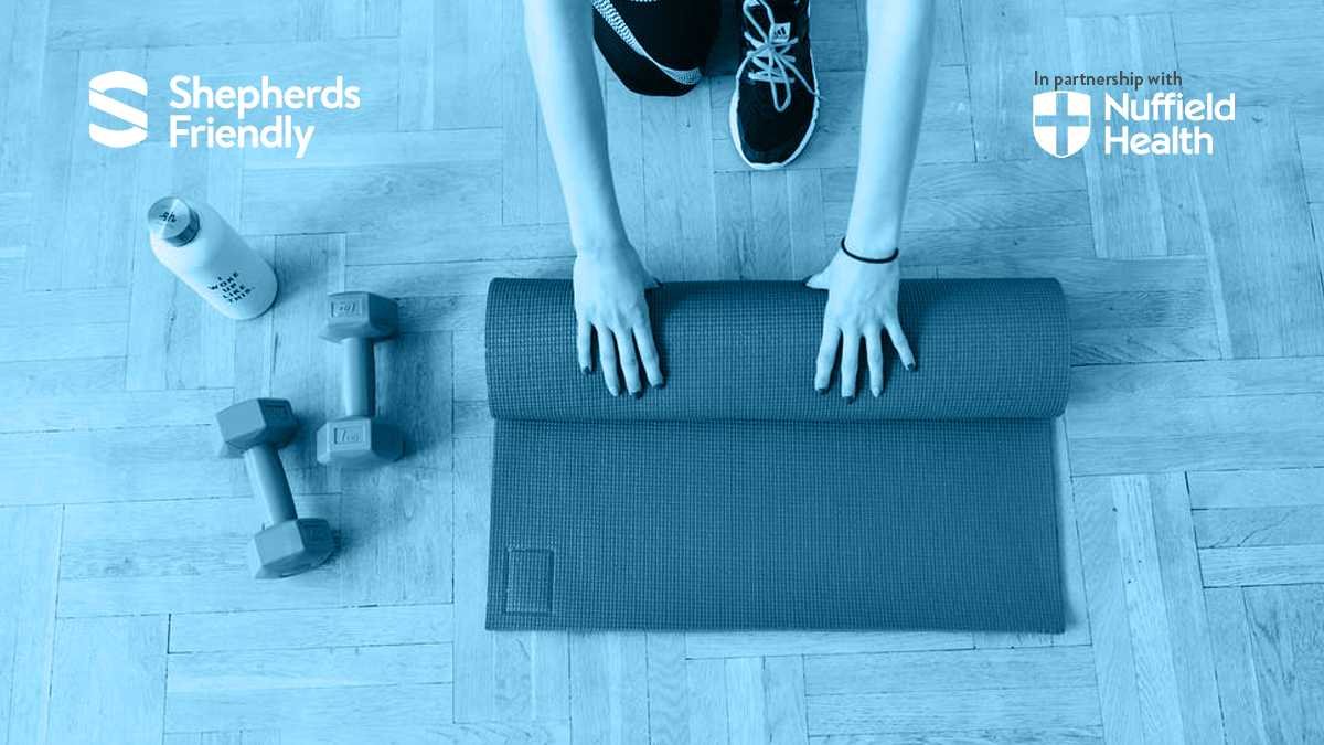 shepherds friendly member with gym mat and dumbbells working out at a nuffield health gym